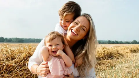 Lulu Green/Little Moon photography  Alex Robins with her son and daughter