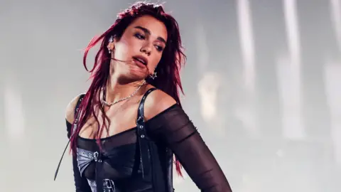 Getty Images Dua Lipa performs onstage during the 66th GRAMMY Awards on February 04, 2024 in Los Angeles, California