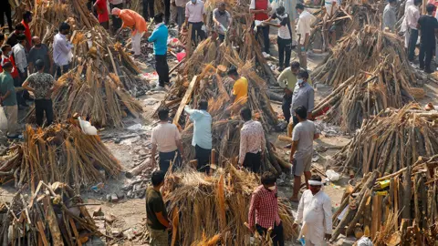 Reuters Unlit funeral pyres in Delhi, India