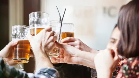 Getty Images People in pub