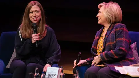 PA Media Chelsea Clinton (left) and Hillary Clinton