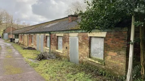 Wigan Council Derelict buildings at old zoo site on School Lane, Haigh