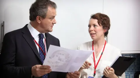 Hugh Bonneville and Olivia Colman in Twenty Twelve (2012)