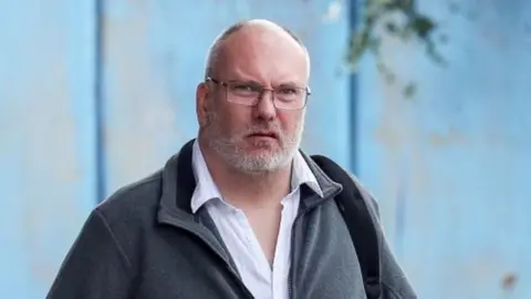 PA Media Peter Hartley, 50, arriving at Aylesbury Crown Court