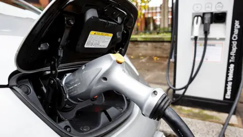 Getty Images Charging point for electric car