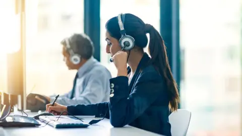 Getty Images Call centre worker