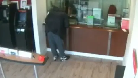 Counter Terrorism Policing South East (CTPSE) A CCTV image of Salim Wakil in a bank