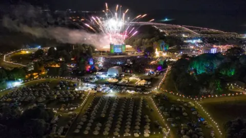 Getty Images A fireworks finale marks the end of Camp Bestival at Lulworth Castle in 2019