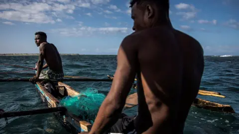 Getty Images Fishermen on a boat.