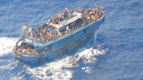 Greek Coast Guard An aerial shot of the fishing vessel carrying migrants 