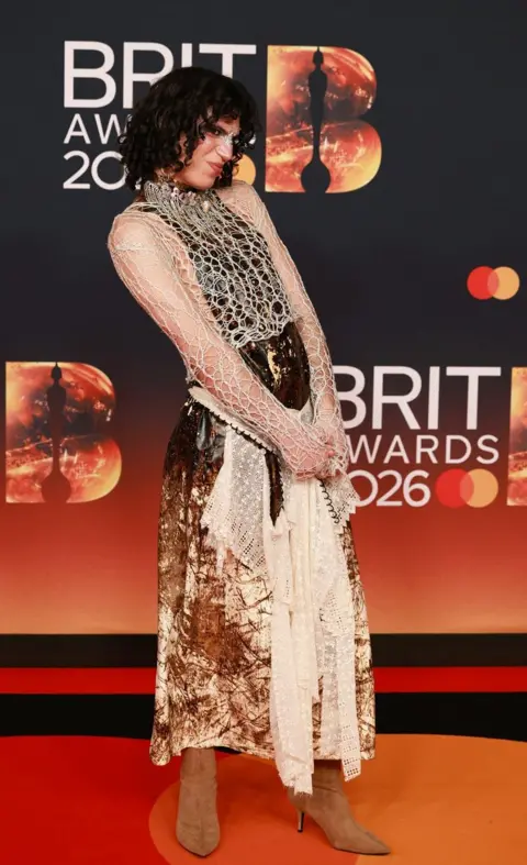 Reuters Jacob Alon poses on the red carpet during for the BRIT Awards at the Co-op Live Arena, in Manchester