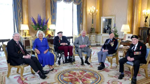 BBC King Charles III and Queen Camilla meeting D-Day veterans Arthur Oborne, Jim Miller, Bernard Morgan and John Dennett in Buckingham Palace