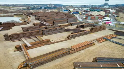 Christopher Furlong/Getty Images Steel stock near British Steel's works at Scunthorpe