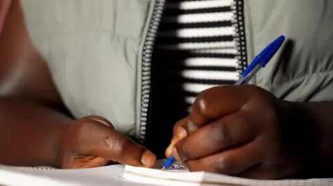 BBC/Yedeta Berhanu Lillian, studying at home in Nairobi