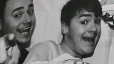 Family photos A picture of Ben with a friend