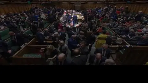 HoC Liz Truss and Sir Keir Starmer chatting in the Commons after Prime Minister's Questions