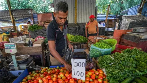 Getty Images Vegetable Seller in Pettah. August 25, 2022 Colombo, Sri Lanka.