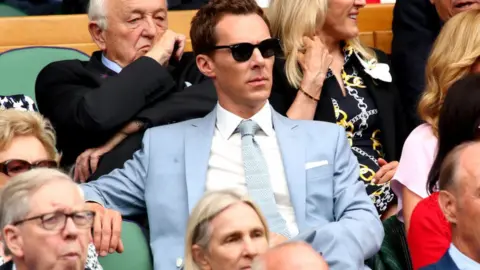 Getty Images Actor Benedict Cumberbatch wore a Richard James suit to Wimbledon this year