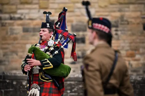 Getty Images Piper at Edinburgh Castle