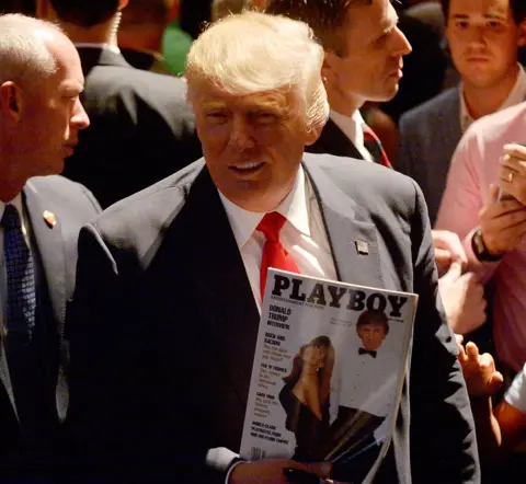 Sara D. Davis Donald Trump carrying a Playboy magazine with himself on the cover at a campaign event in 2016