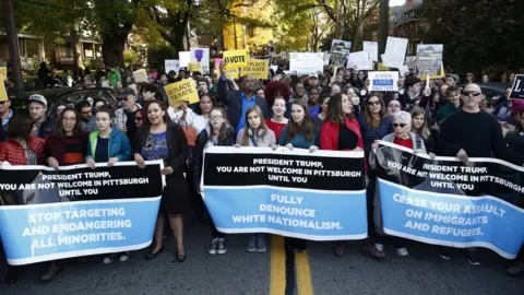 AFP Multiple groups of marchers make their way towards the Tree of Life synagogue three days after a mass shooting in Pittsburgh, Pennsylvania
