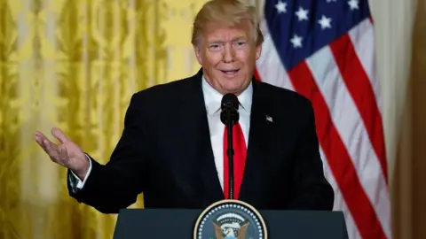 Reuters President Trump at a news conference in the White House on 10 January 2018