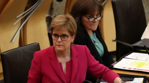 PA Media Nicola Sturgeon and Jeane Freeman