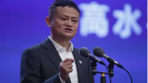 Getty Images Jack Ma speaking at a lectern