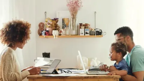 Getty Images Family working from home