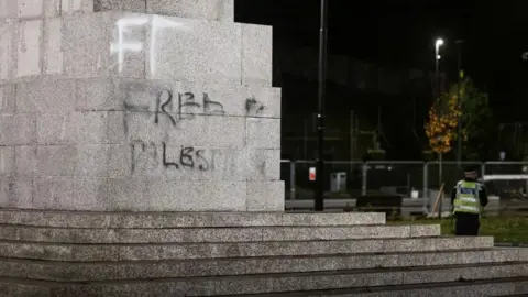 MEN The war memorial was vandalised with 'Free Palestine' graffiti on Tuesday afternoon