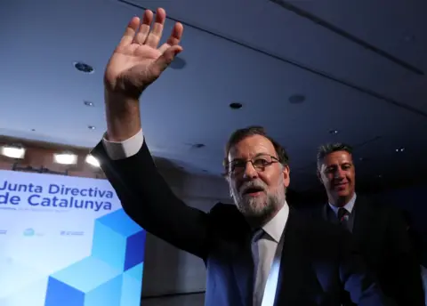 Reuters Spanish Prime Minister Mariano Rajoy waves at his arrival to a Catalan regional Popular Party meeting in Barcelona, Spain, 15 September