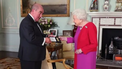 PA Media The Queen with Professor Mark Compton, Lord Prior of the Order of St John, on 11 March 2020
