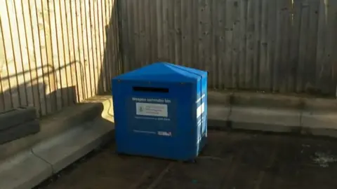 Blue knife amnesty bin