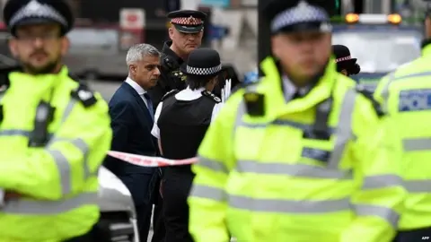 AFP Sadiq Khan with Met Police officers