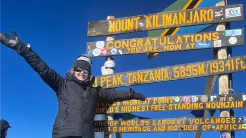 Love Grace x Gill Millane at peak of Mount Kilimanjaro