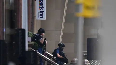 Getty Images Police Scotland firearms officers at the scene