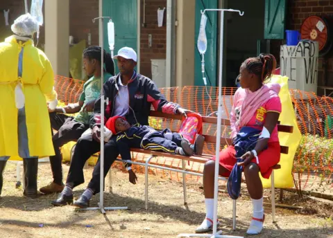 EPA Suspected Cholera patients are being attended to at the Beatrice Infectious diseases hospital in Mbare, Harare, Zimbabwe, 11 September 2018.