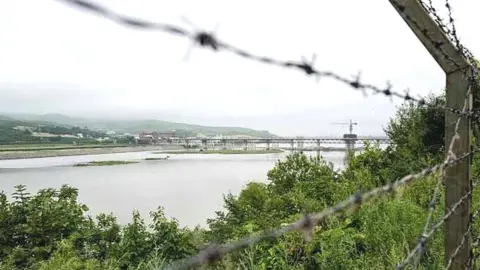 Getty Images Fences run along the Tumen river