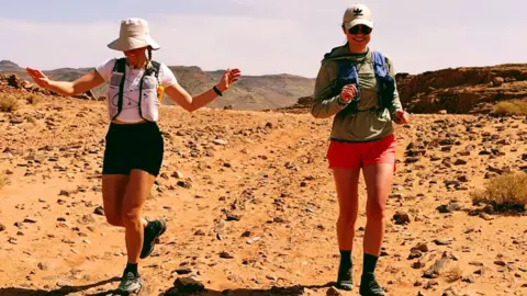 Philippa Morris Philippa Morris and another runner in the desert