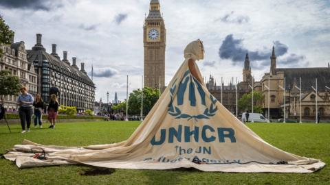 Dress made out of a decommissioned refugee tent donated by the UNHCR