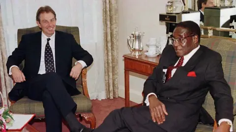 PA Tony Blair and Robert Mugabe in 1997