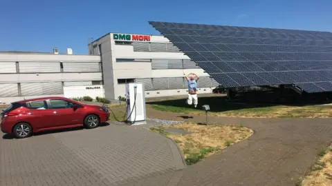 Roger Munford Roger Munford was delighted to find a charging point connected to solar panels on his trip to Poland