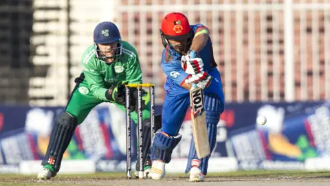 Afghanistan's Gulbadin Naib in action against Ireland
