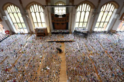 Getty Images A view of thousands of birthday cards laid out in a large hall