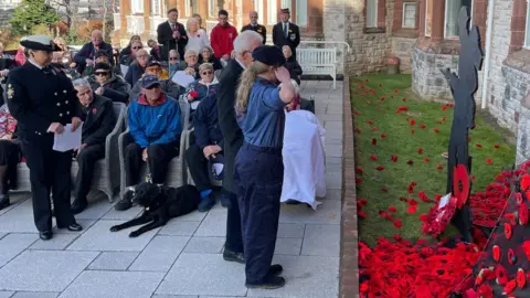 BBC The Blind Veterans UK held an act of remembrance at its wellbeing centre in Llandudno