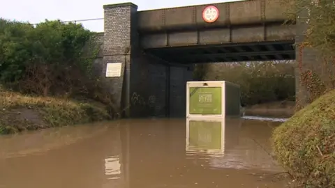 Asda truck in flood hit road