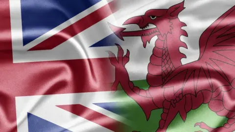 Getty Images Union flag merged into Welsh dragon flag