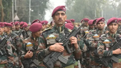Getty Images Soldiers rehearsing for the Republic Day parade on 24 January 2022