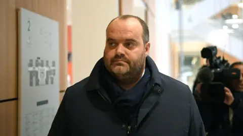 AFP French meat supplier Spanghero's managing director Jacques Poujol arrives in a Paris court on 21 January 2019