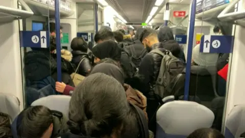 Busy train carriage